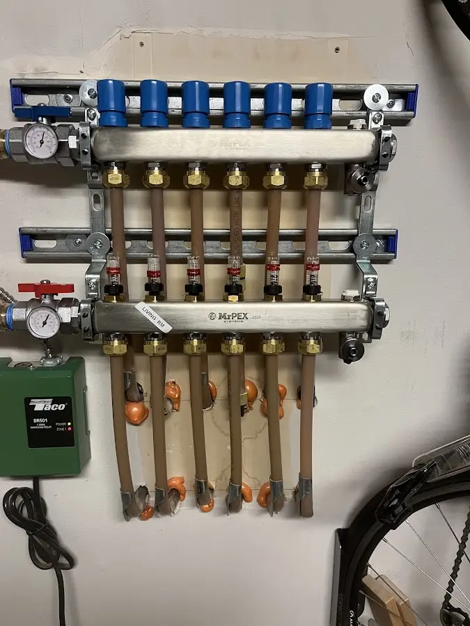 Plumber performing Water Heater Repair at a residential property in Point Pleasant Beach